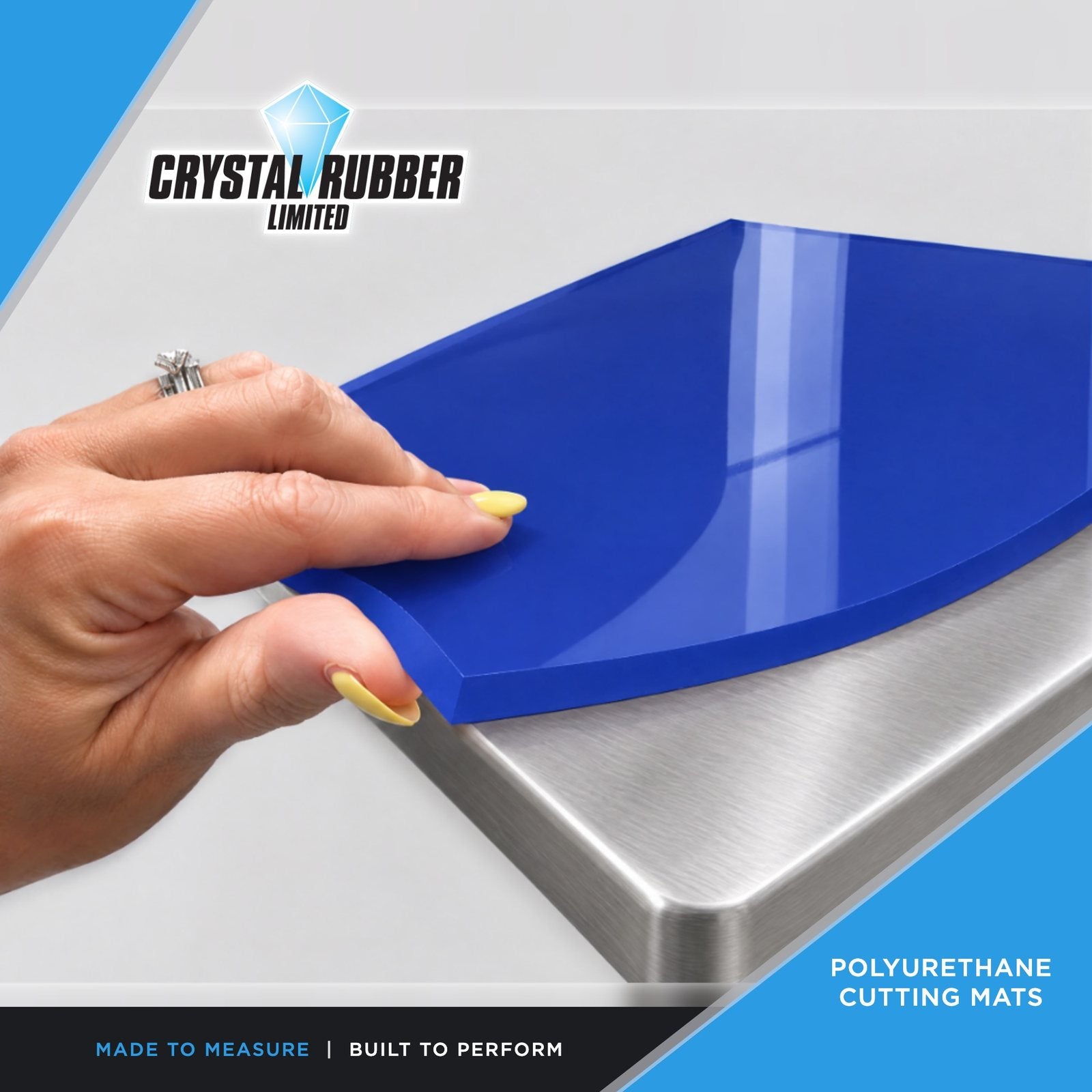 Blue self-healing polyurethane cutting mat on a stainless steel bench