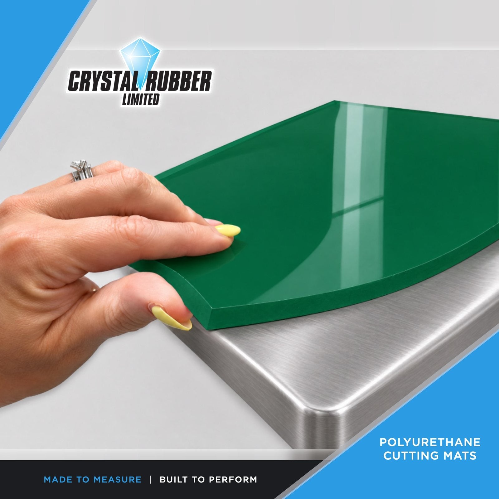 Green polyurethane cutting mat on a stainless steel bench
