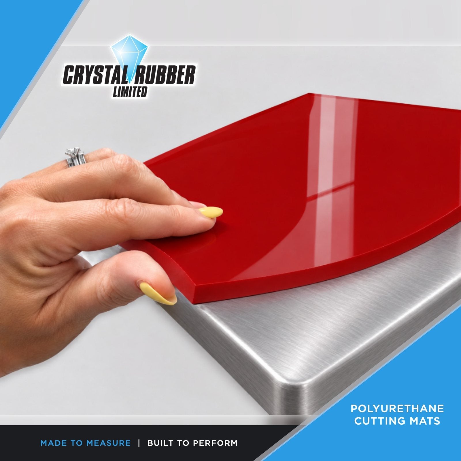 Red polyurethane cutting mat on a stainless steel bench