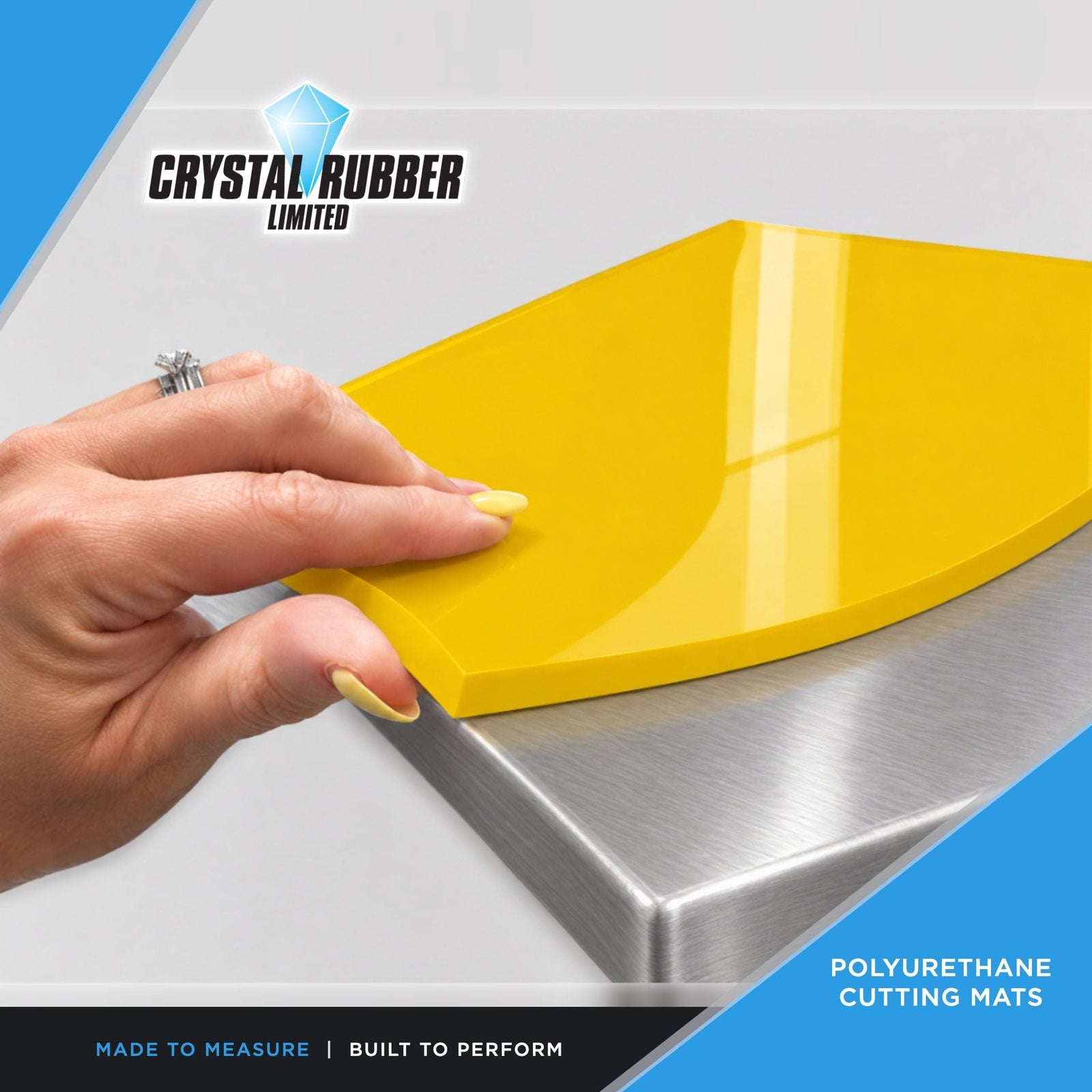 Yellow polyurethane cutting mat on a stainless steel bench